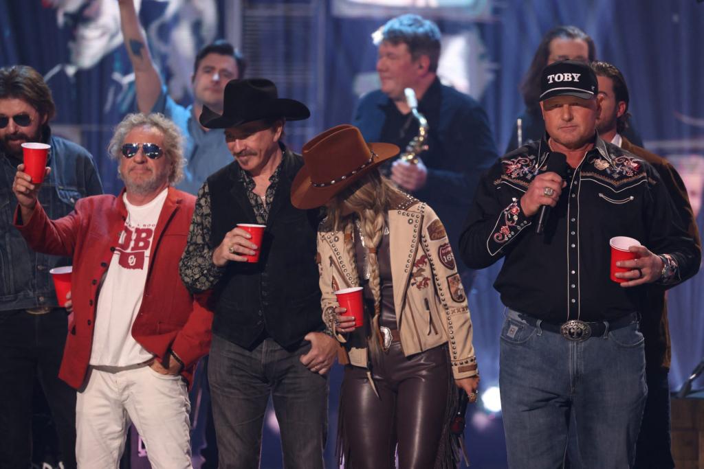 Sammy Hagar, Roger Clemens, and Lainey Wilson on stage during a tribute to Toby Keith at the CMT Music Awards in Austin, Texas, 2024