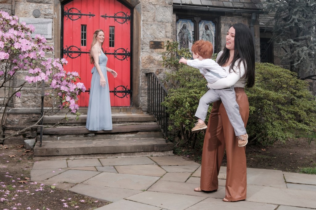 Sandra Weir, a wedding nanny from Yonkers, with redheaded boy at wedding.