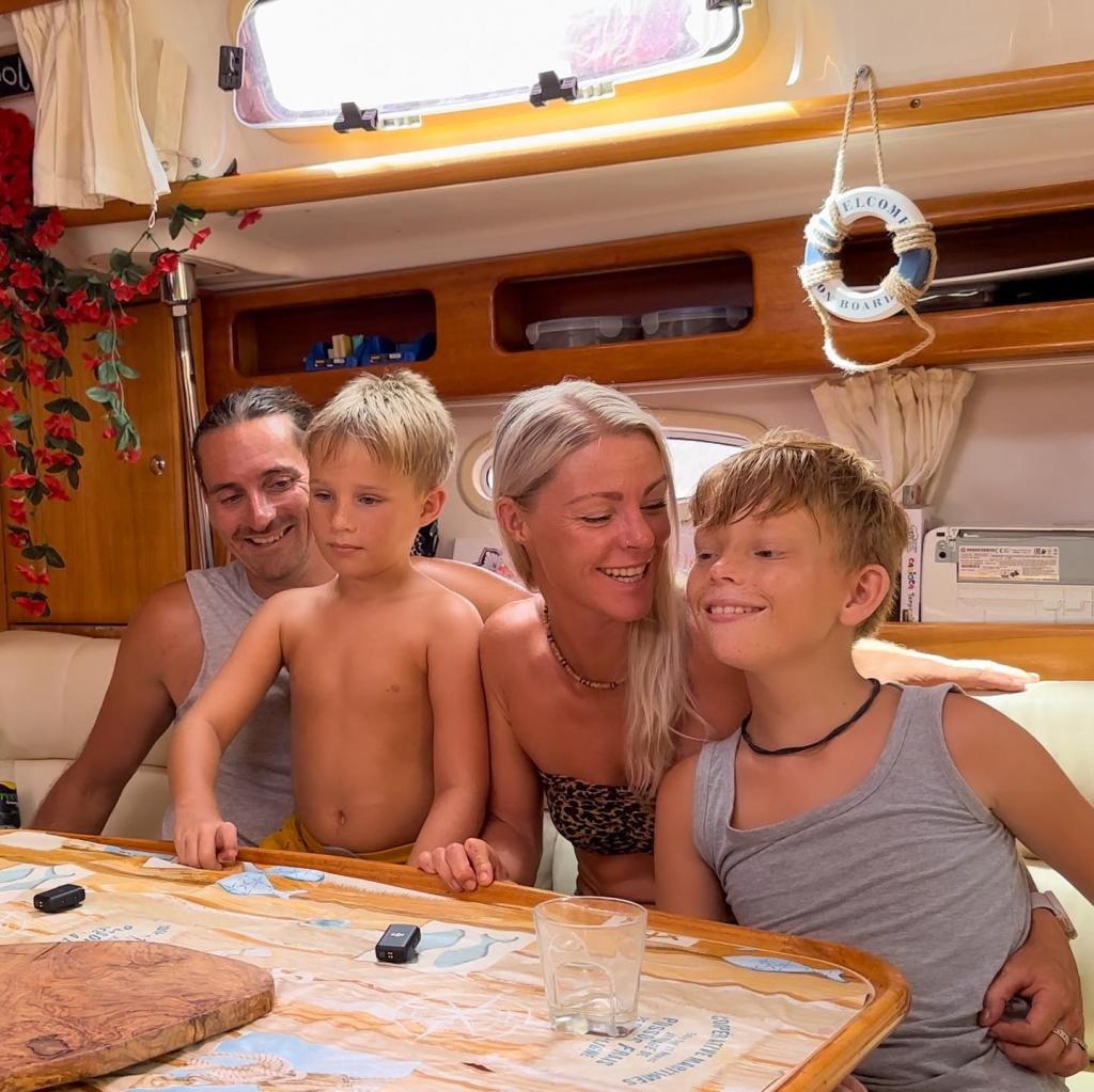 the Colledge family inside their boat