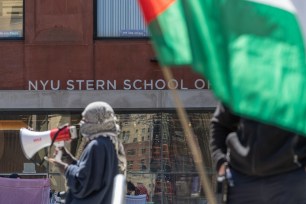 New York University (NYU) students set up a "Liberated Zone" tent encampment in Gould Plaza at NYU Stern School of Business on April 22, 2024 in New York City.