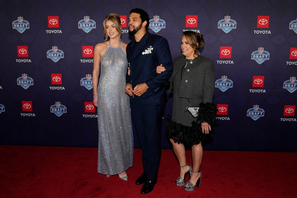 Southern California quarterback Caleb Williams posing on the red carpet at the 2024 NFL Draft in Detroit