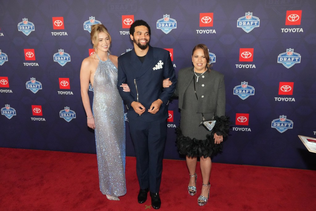 Caleb Williams on the red carpet with his girlfriend (left) at the 2024 NFL Draft on April 25, 2024.