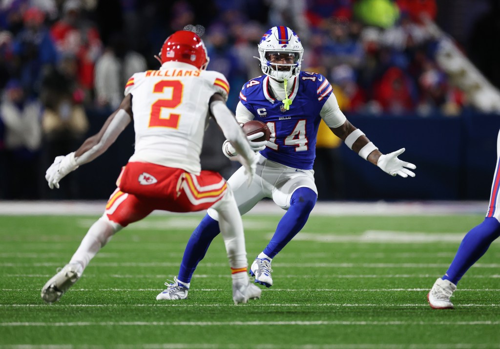 Stefon Diggs #14 of the Buffalo Bills runs against Joshua Williams #2 of the Kansas City Chiefs during their AFC Divisional Playoff game at Highmark Stadium on January 21, 2024 in Orchard Park, New York.   