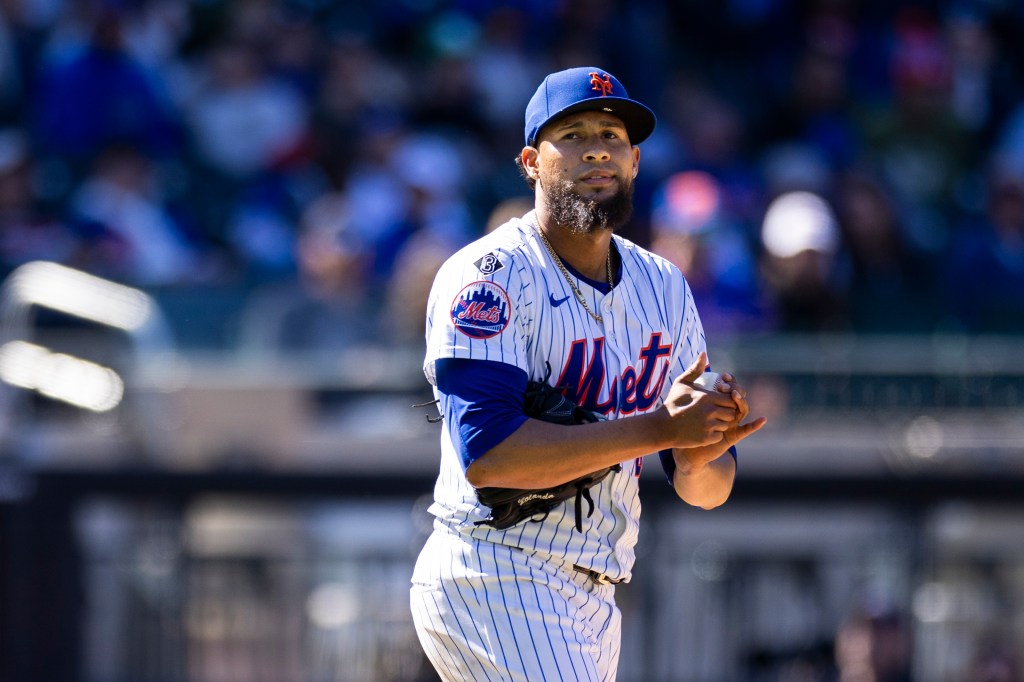  Mets relief pitcher Yohan Ramirez (46) who was suspended for throwing at the head of Milwaukee Brewers first baseman Rhys Hoskins (12) yesterday, appealed it and reacts on the mound