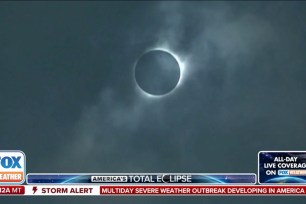 A total solar eclipse occurring under clear skies