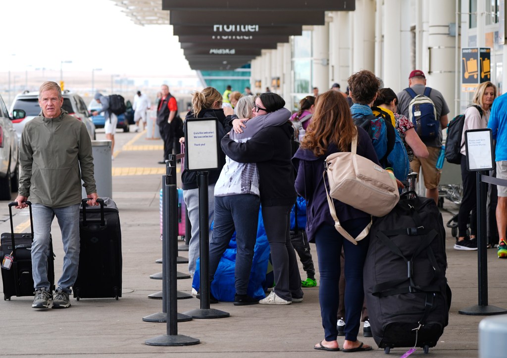 Travelers lining up at the curbside checkpoint for Southwest Airlines outside Denver International Airport on April 16, 2024