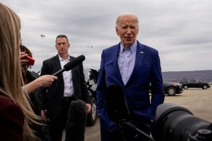 President Joe Biden speaks to reporters before boarding Air Force One en route to Pittsburgh, Pennsylvania.