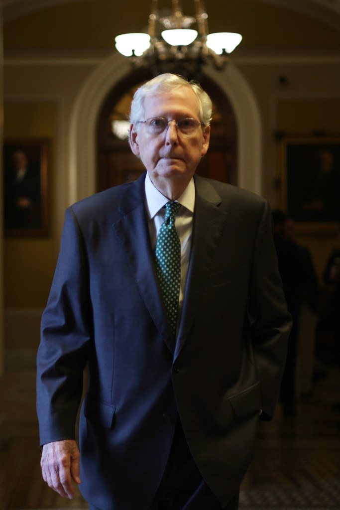 Senate Minority Leader Sen. Mitch McConnell (R-KY) passes through a hallway at the U.S. Capitol on April 17, 2024 in Washington, DC.