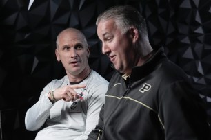 UConn coach Dan Hurley (l) and Purdue coach Matt Painter (r) battle for the national title game.