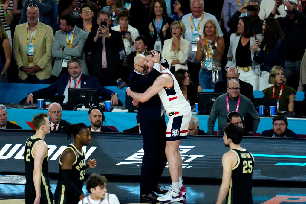 Dan Hurley celebrates during UConn's win over Purdue on Monday.