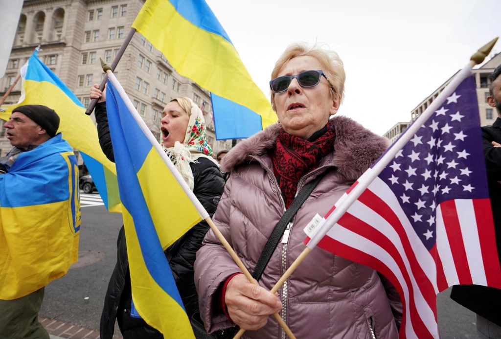 Ukrainian supporters holding flags during a demonstration against Russia's invasion, near the White House, Washington, U.S., March 1, 2022