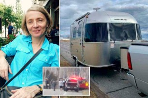 A woman standing next to a silver Airstream trailer on a highway