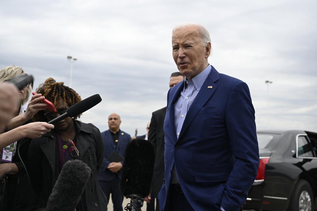 US President Joe Biden speaking to the media at Wilkes-Barre Scranton International Airport before boarding Air Force One, discussing equal pay for female athletes