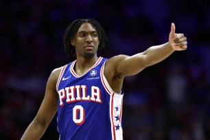Tyrese Maxey #0 of the Philadelphia 76ers reacts during the first quarter against the New York Knicks game three of the Eastern Conference First Round Playoffs.