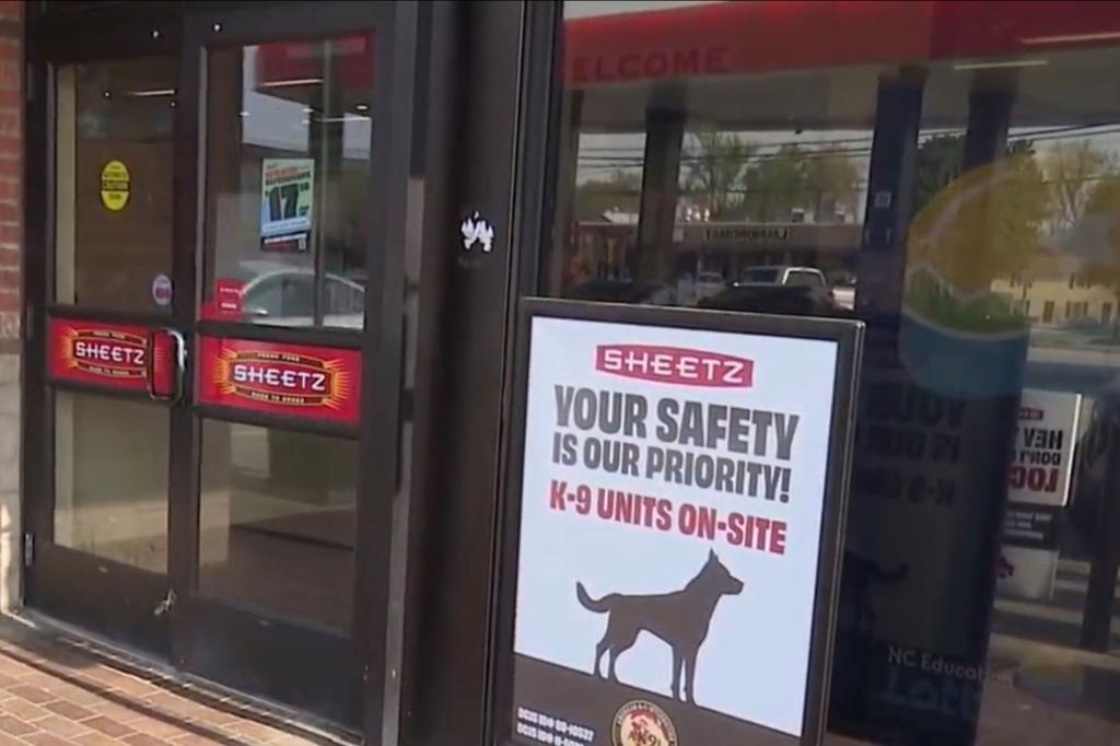 Sign reading "Your safety is our priority! K-9 units on-site," at Sheetz station in Greensboro. 