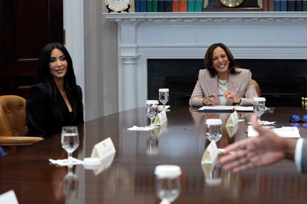 Vice President Kamala Harris, right, and Kim Kardashian, left, listen during a discussion in the Roosevelt Room of the White House in Washington, Thursday, April 25, 2024, on criminal justice reform and the pardons issued by President Joe Biden earlier this month.