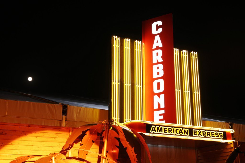 The Carbone Beach supper club exterior shows a marquis sign 