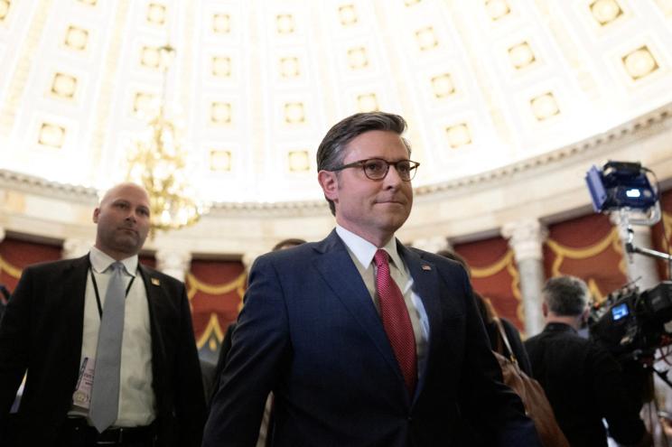 House Speaker Mike Johnson walks to the House Chamber, ahead of President Joe Biden's State of The Union Address on Capitol Hill in Washington, U.S., March 7, 2024.