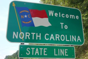 North Carolina state line highway sign.