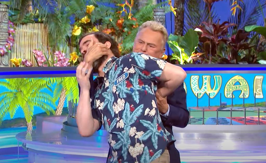 Pat Sajak puts a contestant in a chokehold during a weird moment on "Wheel of Fortune" in March 2023.