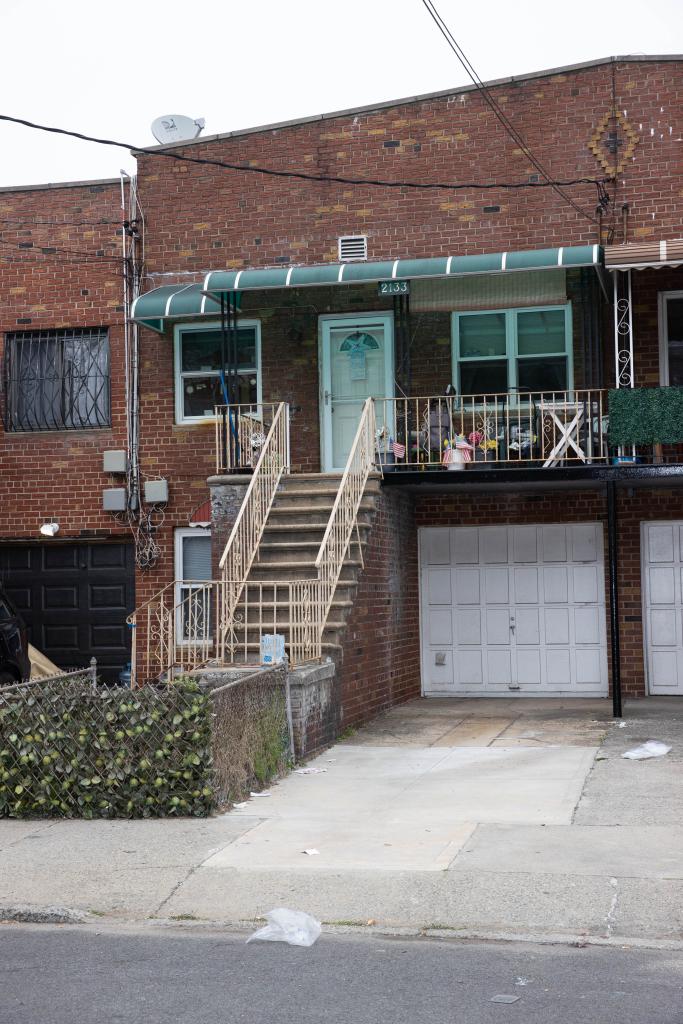 Home with stairs to second-floor entrance and driveway on West 10th Street in Gravesend, Brooklyn.