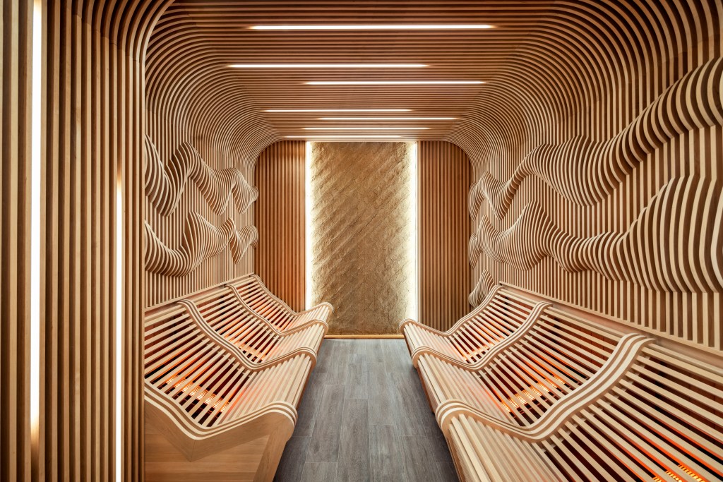 Image of World Spa's infrared sauna, with undulating walls and benches to direct heat.