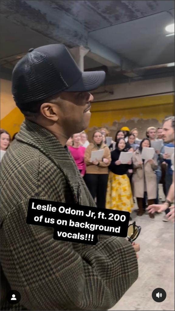 Leslie Odom Jr. in a black hat leading a singalong to his song, 'Loved'