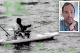 Chris Smelley in stranded kayak