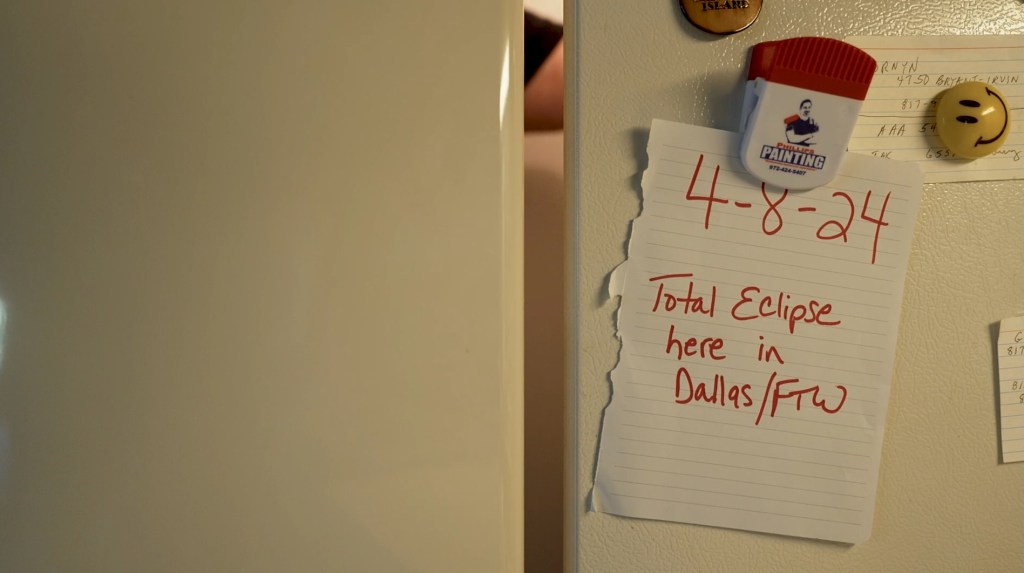 Note on fridge reading "4-8-24 total eclipse here in Dallas/FTW"