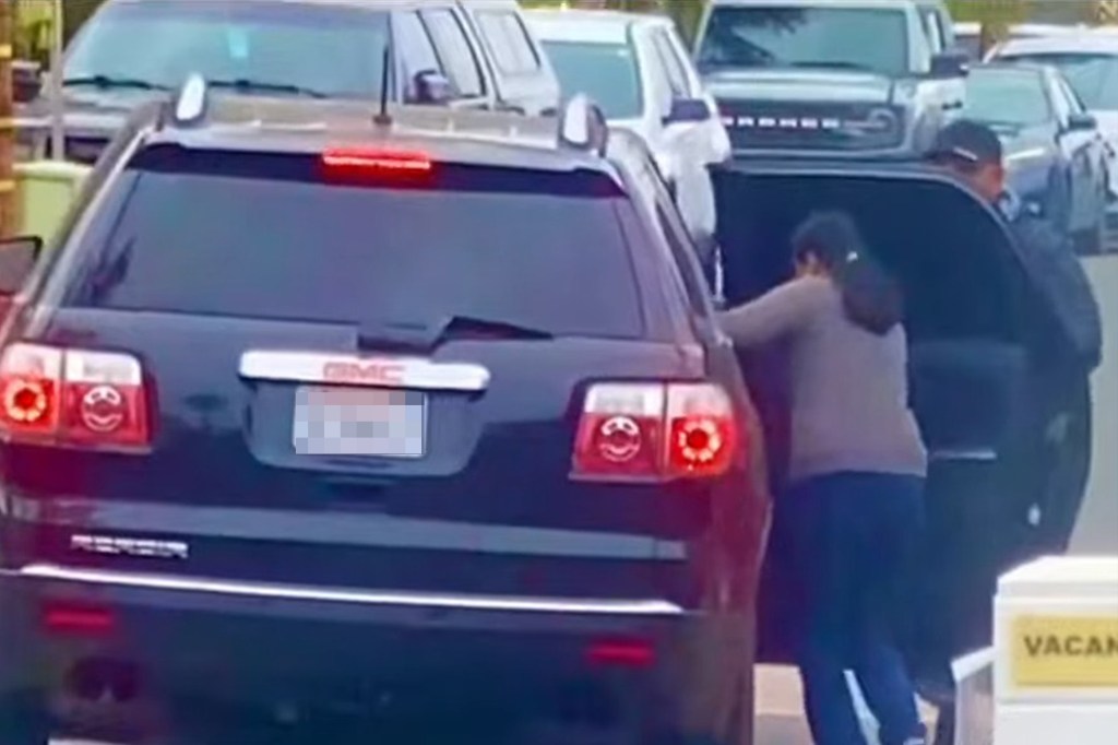 The migrants were then seen piling into a black SUV near Ocean Street, according to videos posted.
