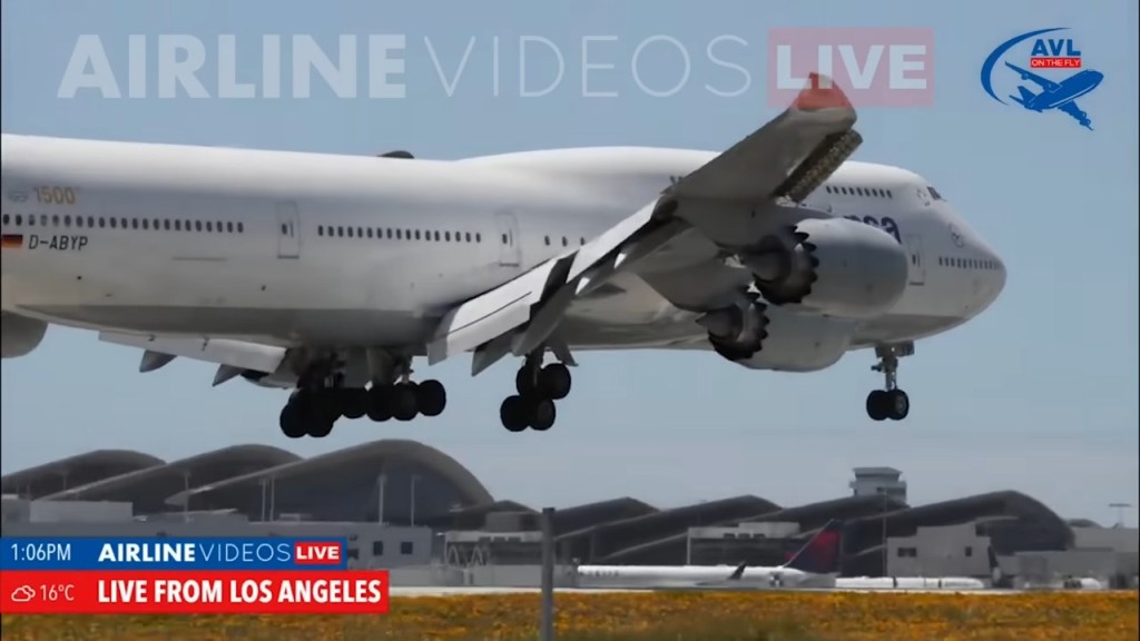 The 747 can be seen bouncing off the hard runway pavement twice, its wheels barely over the ground before crashing back down.