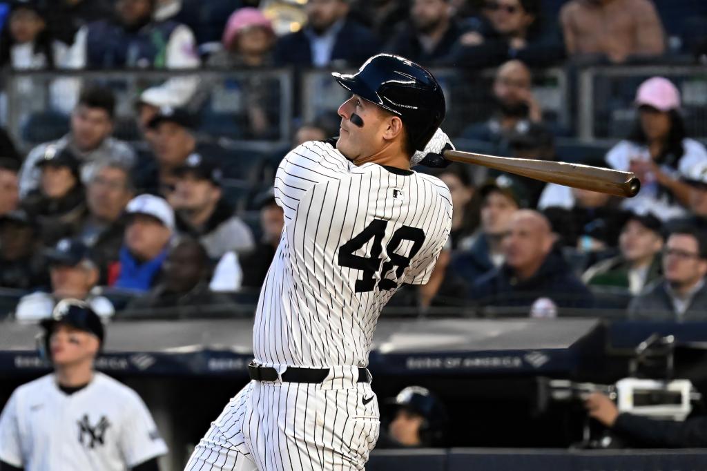 Anthony Rizzo hits a first inning home run against the As on Tuesday.