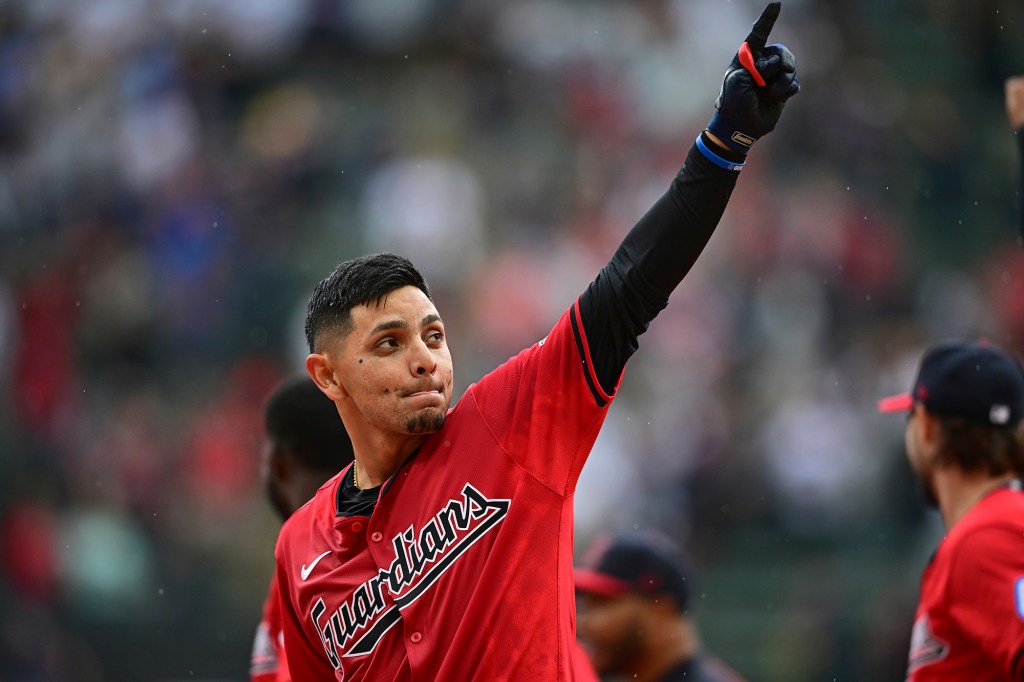 Andrés Giménez celebrates after driving in the game-winning run in the 10th inning of Sunday's game.