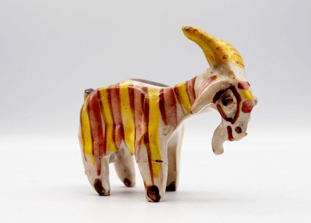 Ceramic goat with yellow and red stripes, created by King Charles over 50 years ago, set to be auctioned