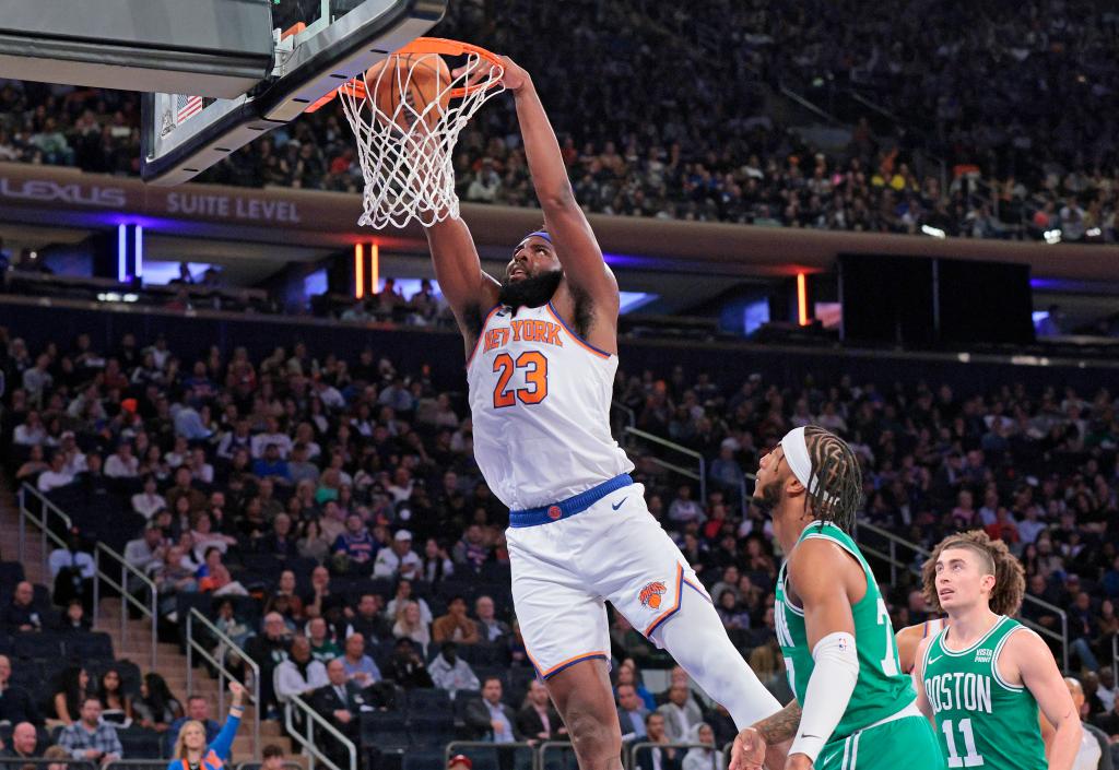 New York Knicks center Mitchell Robinson #23 slams the ball during the first quarter.