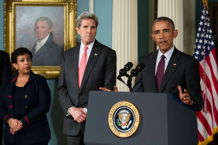 (L-R) Attorney General Loretta Lynch and Secretary of State John Kerry look on as U.S. President Barack Obama makes a statement after meeting with his National Security Council at the State Department, February 25, 2016 in Washington, DC.