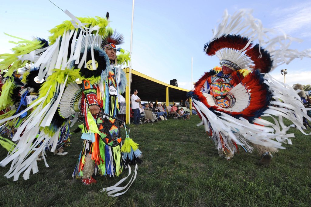 A picture dated 06 August 2010 shows Lakota Oglala tribal chiefs dressed in traditional outfits dancing during the Grand Entry of the 25th Annual Oglala Nation Pow Wow.