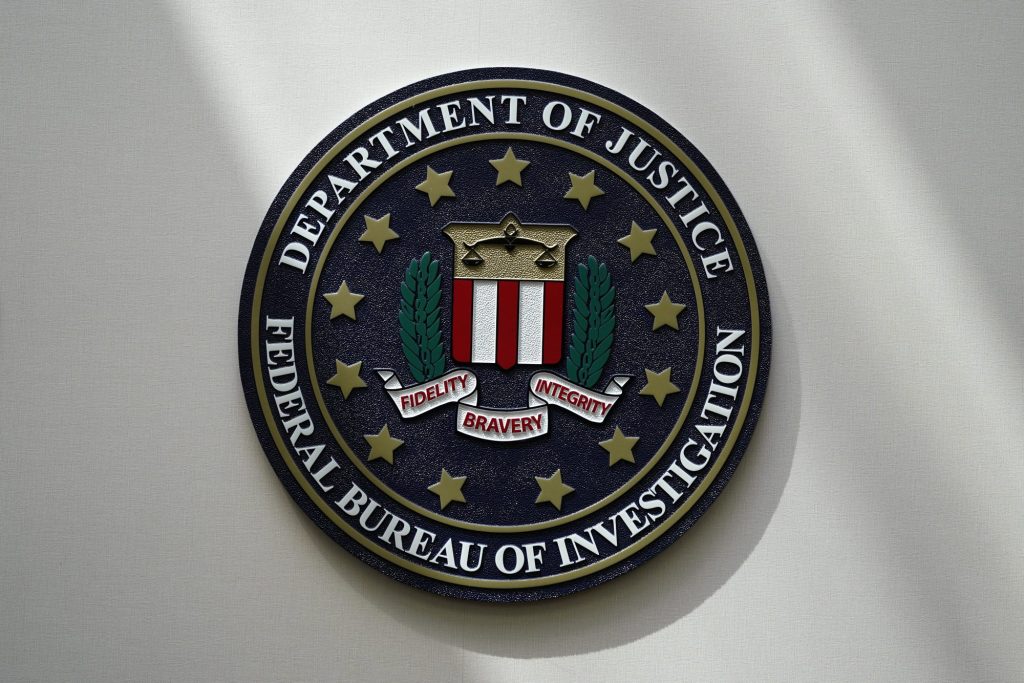 FBI seal displayed in Omaha, Nebraska with significance to growing tension in Congress towards FBI and its intelligence agencies