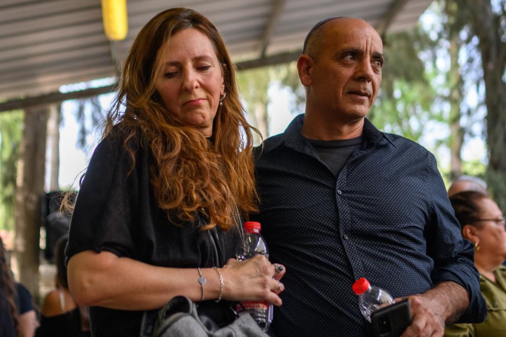 Ricarda Louk and Nissim Louk arrive for the funeral service of their daughter Shani Louk on May 19, 2024 in Srigim-Li On, Israel. Louk, a German-Israeli citizen, was killed at an intersection near the Nova music festival site on October 7, 2023 during the attack by Palestinian militants who crossed into Israel from the Gaza Strip. 