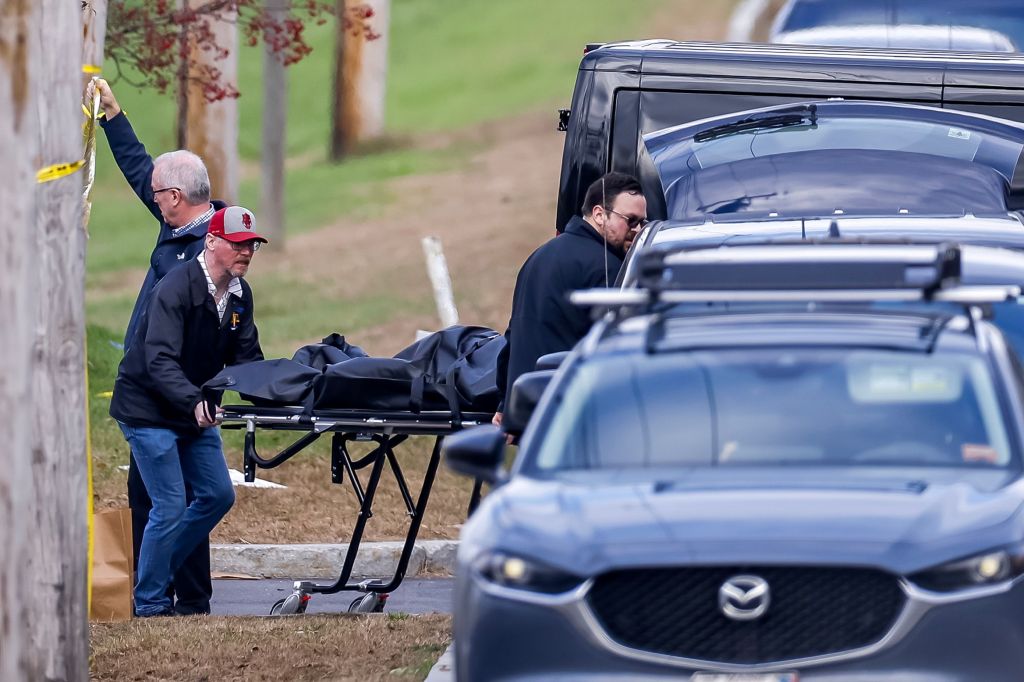 A body is removed from inside Schemengees Bar and Grille, following a multiple fatality mass shooting inside at least two locations in Lewiston, Maine, USA, 26 October 2023. 