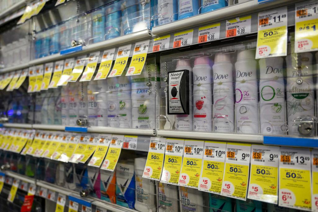 Dove products locked up at target with 50% off tags shown