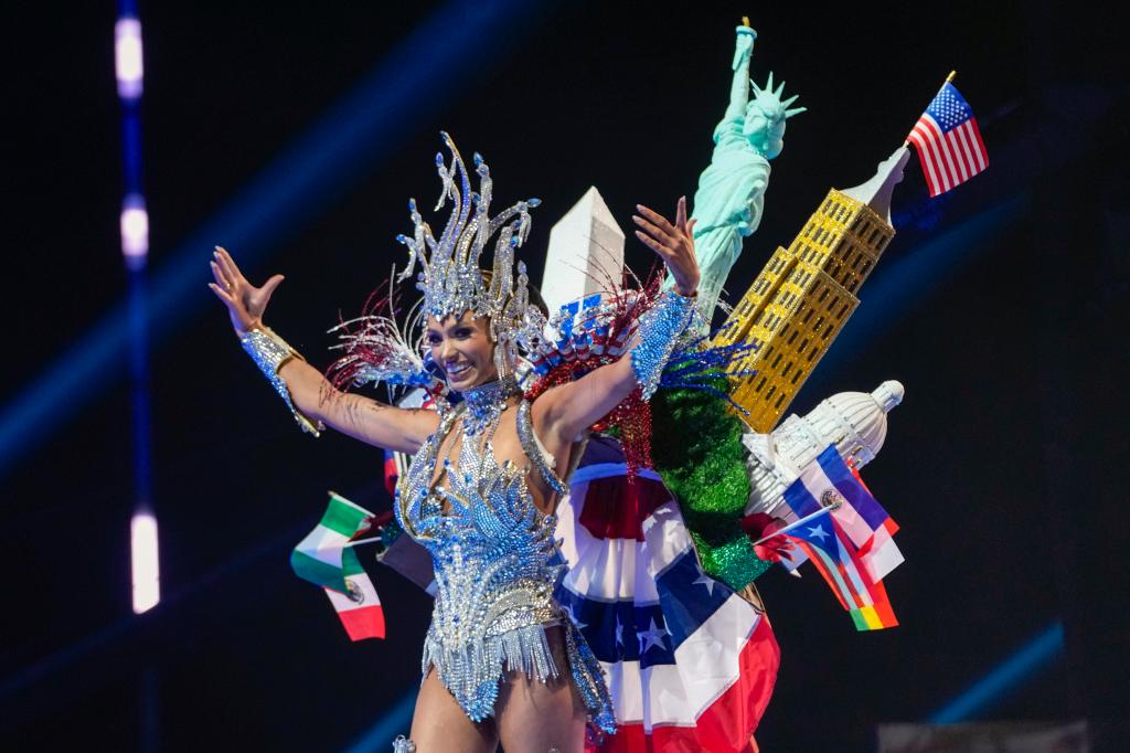 Miss USA Noelia Voigt in a costume adorned with replicas of the Statue of Liberty, the US Capitol Building and more at the Miss Universe Beauty Pageant 2023