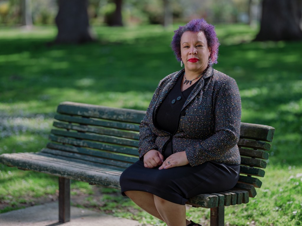 Dr. Tablia Lee on a bench