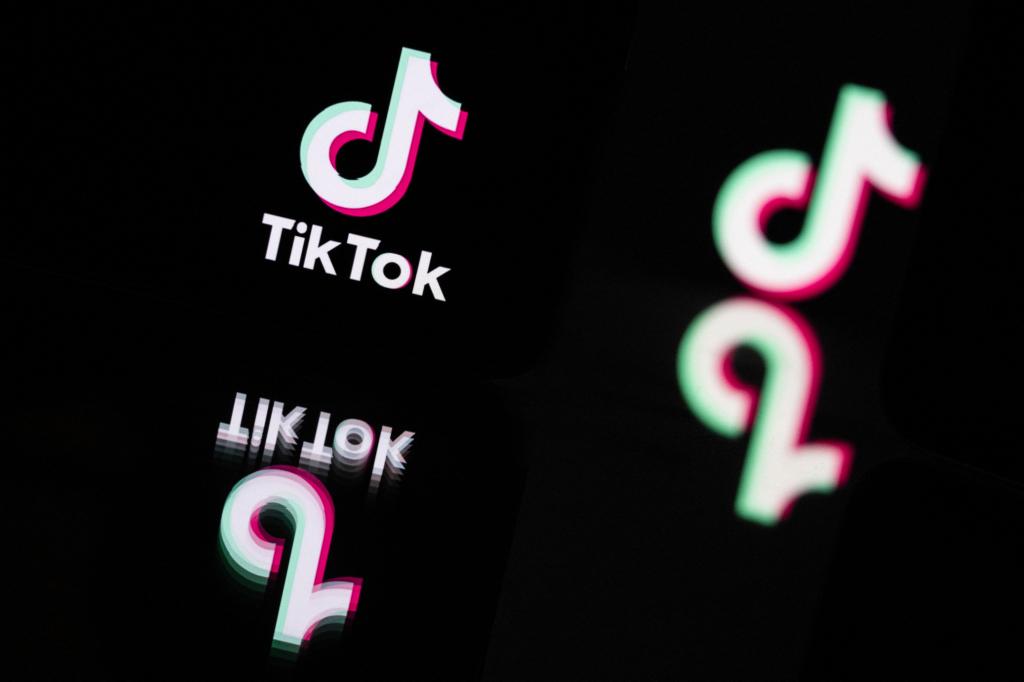 TikTok logo reflected in mirrors in a picture taken in Mulhouse, eastern France on October 19, 2023