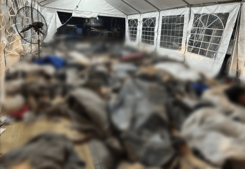 Scores of body bags were placed inside a tent containing victims of the Nova musical festival slaughter on Oct. 7.
