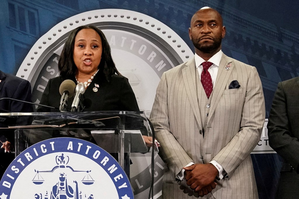 Willis speaks at a press conference next to Wade after a Grand Jury brought back indictments against former president Donald Trump and his allies in their attempt to overturn the state's 2020 election results, in Atlanta, Georgia, on Aug. 14, 2023. 
