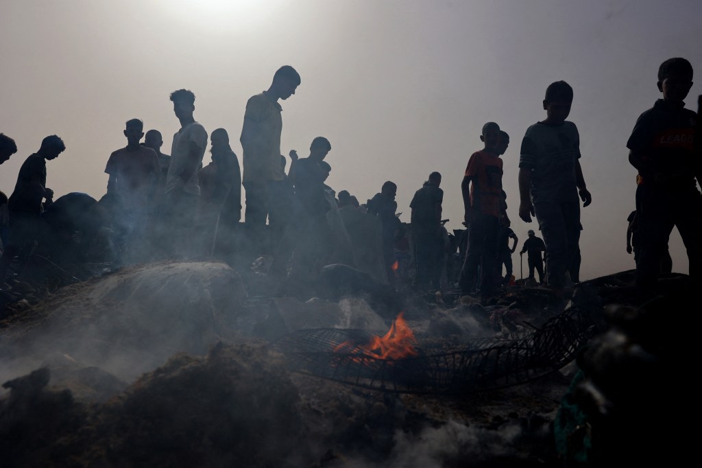 Israel claims a second blast occurred at the refugee camp that caused the blaze.