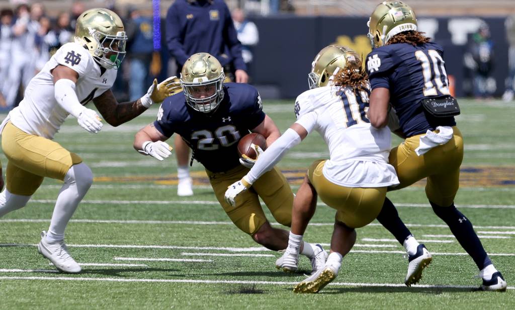 Aneyas Williams (20) runs Saturday, April 20, 2024, at the annual Notre Dame Blue-Gold spring football game at Notre Dame Stadium.