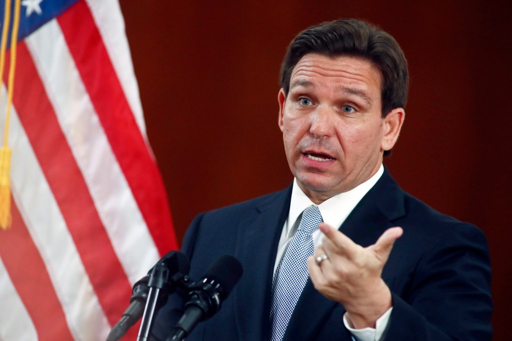 Florida Governor Ron DeSantis answering questions from the media at the state Capitol in Tallahassee