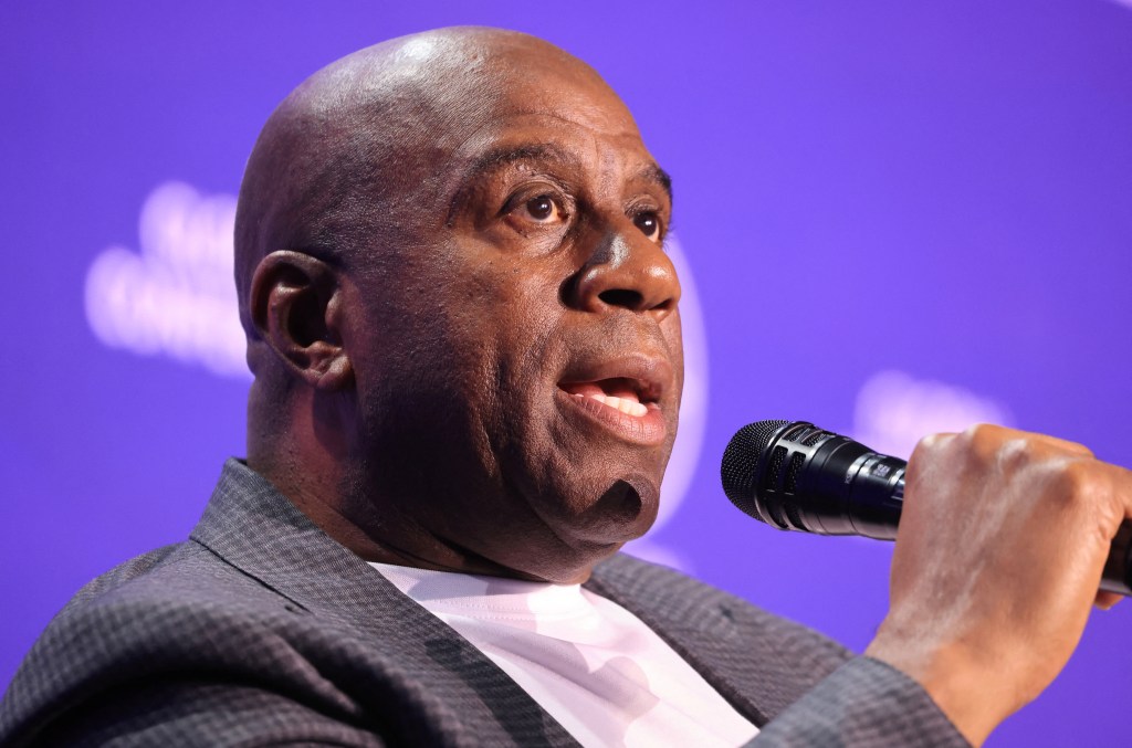 Magic Johnson speaks in May 2024.